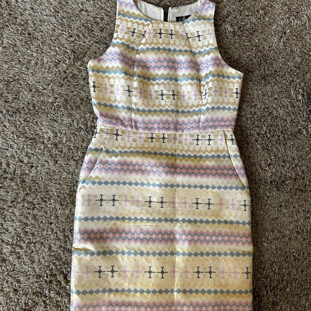 Pink blue and cream dress